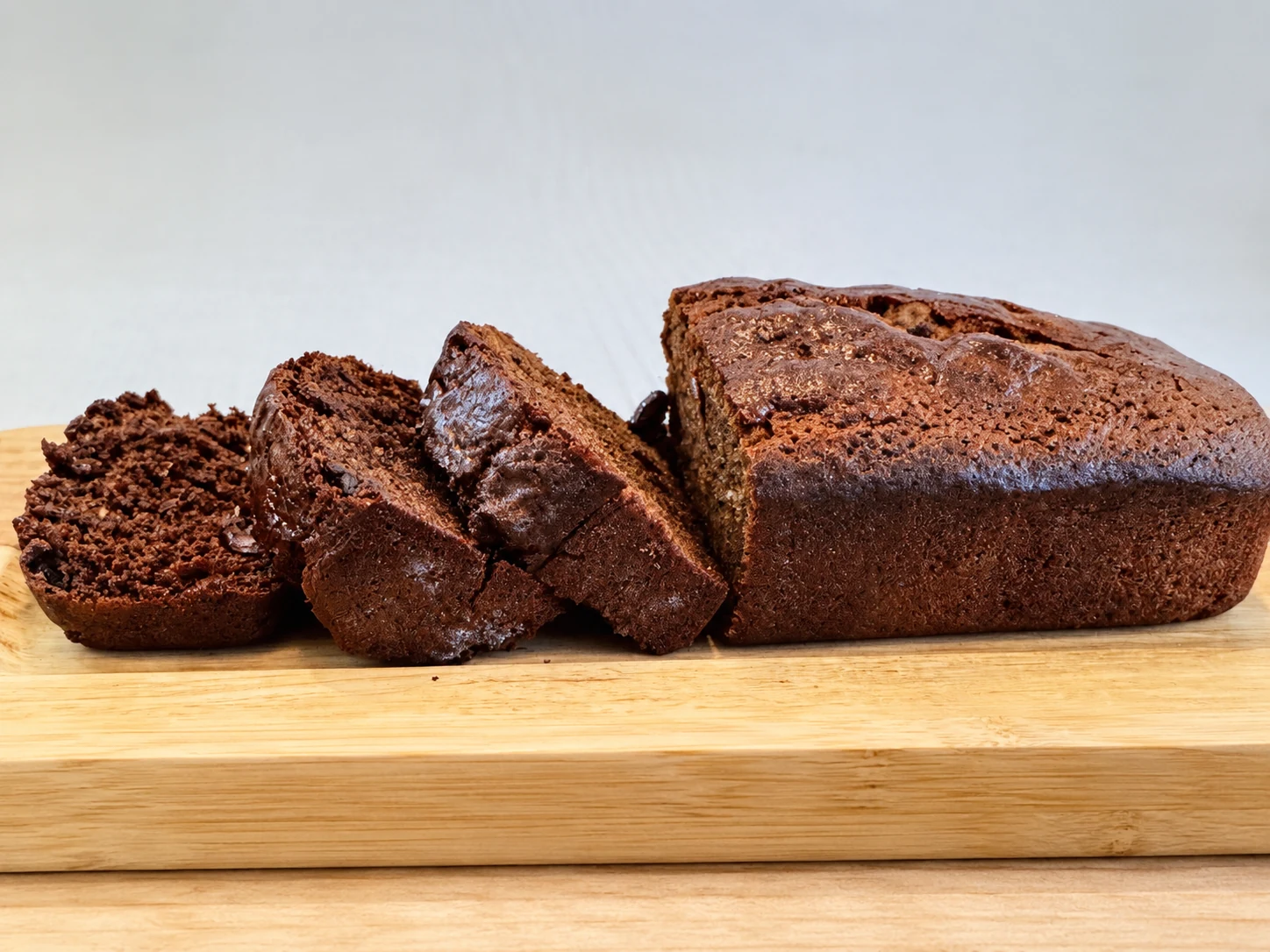 Slices and a loaf of chocolate chip zucchini bread